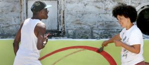 Read more about the article Mural overlooking the future Black Power Blueprint community basketball court nears completion